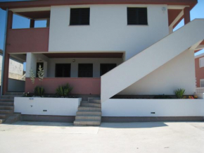 Отель Apartments by the sea Nin, Zadar - 13133  Нин